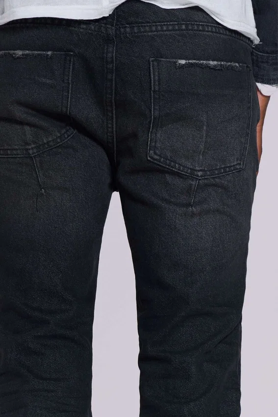 Tvättade svarta Drain-Jeans