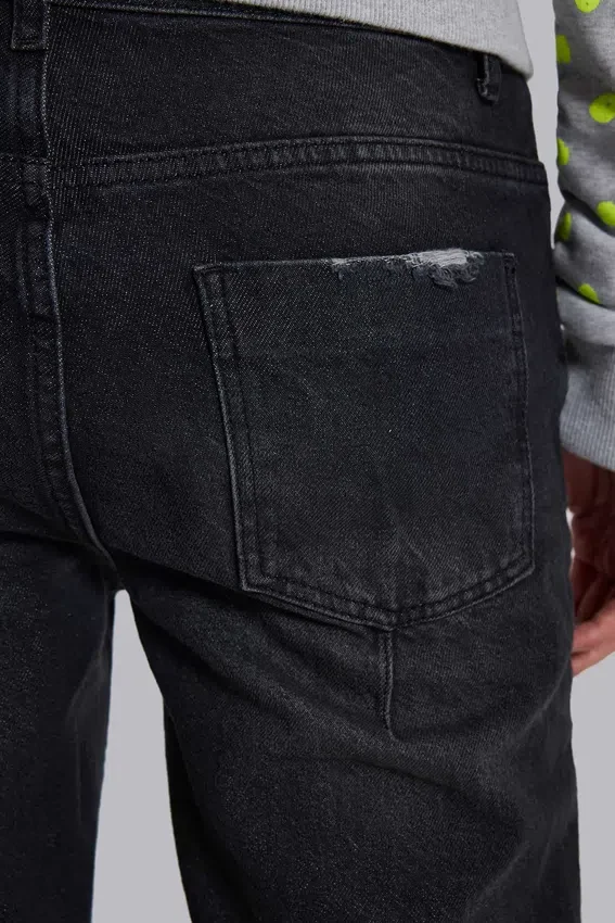 Tvättade svarta Drain-Jeans