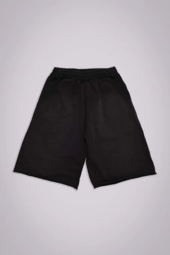 Tvättade svarta Monster Jogger-shorts i baggy-modell