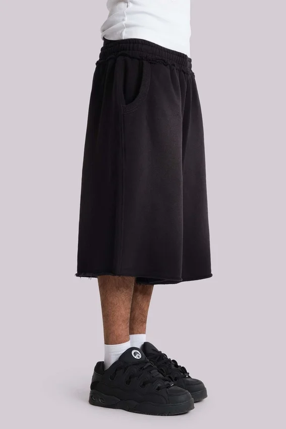 Tvättade svarta Monster Jogger-shorts i baggy-modell