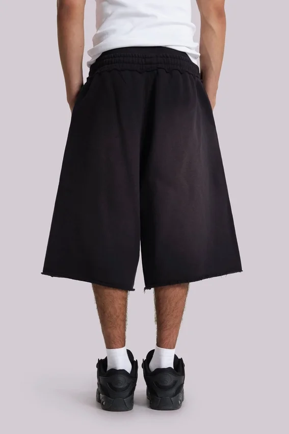 Tvättade svarta Monster Jogger-shorts i baggy-modell