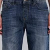 Vintage-tvättade Jude Bootcut-jeans med utsvängda ben