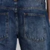 Vintage-tvättade Jude Bootcut-jeans med utsvängda ben