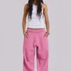 Rosa, vidbyxor med uppvikt benslut i Monster Joggers-stil